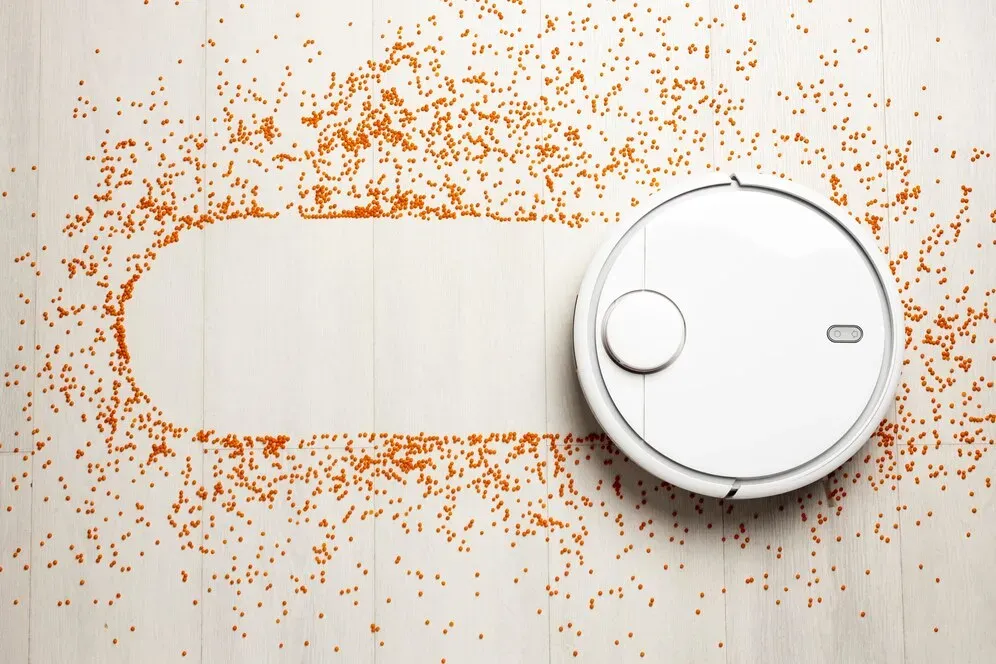 flat-lay-wireless-controlled-vacuum-cleaner_23-2148779294