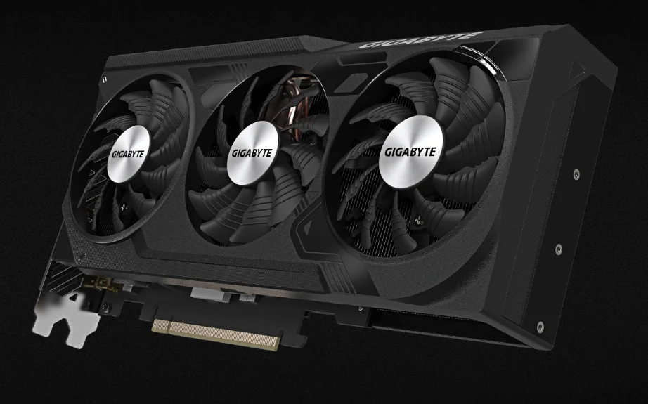 Card đồ họa Gigabyte RTX 4070 Ti SUPER WINDFORCE OC 16G có thiết kế hiện đại, chắc chắn với tông màu đen nhám chủ đạo. Mặt trước được trang bị ba quạt làm mát lớn, xếp ngang, viền bo góc cứng cáp tạo cảm giác mạnh mẽ. Bề mặt có các đường cắt dứt khoát, logo GIGABYTE nhỏ nằm một cách tinh tế ở góc card. Mặt sau được phủ một tấm kim loại phẳng, giúp bảo vệ và tăng độ cứng. Tổng thể card có kiểu dáng dài, dày vừa phải, ngoại hình đơn giản nhưng khỏe khoắn, phù hợp với các dàn máy tối giản hoặc chuyên nghiệp.