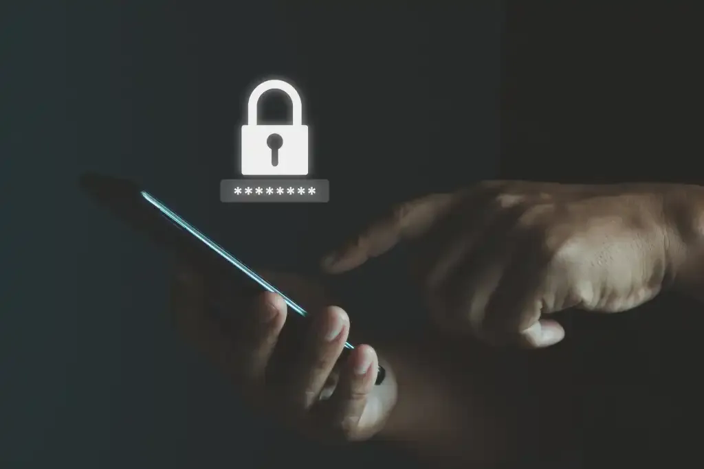 Man-holding-phone-with-password-security-lock-icon