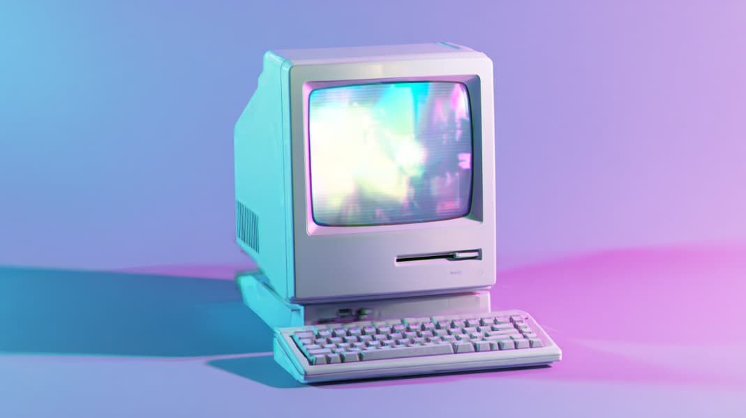 nuneybits_A_retro_glowing_computer_on_gradient_background_that__787eb5d3-f84e-4f97-ba01-27ec03df4a88